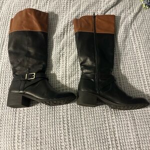 Black and tan knee high boots